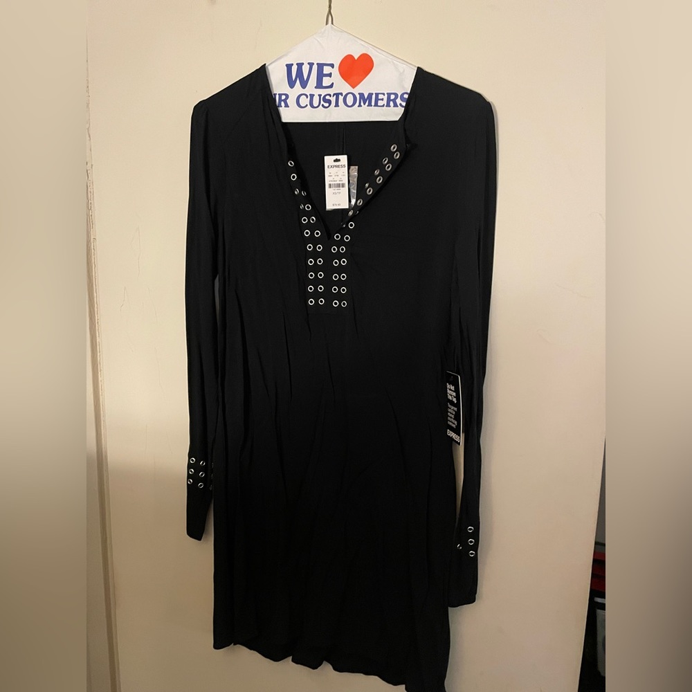 Express black dress/tunic with embellishment. Size XS.